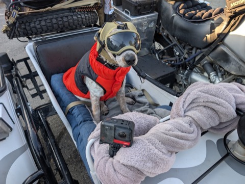 Puffy vest, goggles, helmet, action cam. Somebody's gear budget just doubled.