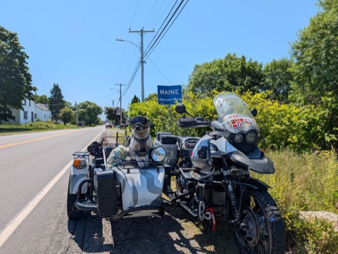 MAINE: Welcome Home. Goggles on, like he owns the state line.